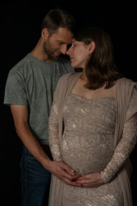 Babybauch-Shooting zusammen mit Partner